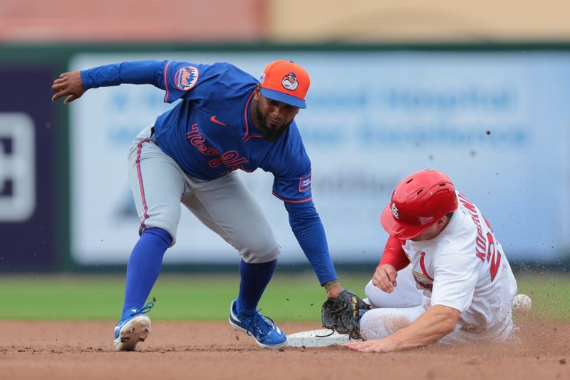 Feb 24, 2025; Jupiter, Florida, USA; St. Louis Cardinals outfielder Matt Koperniak (29) steals second base against New York Mets shortstop Yonny Hernandez (13) during the fifth inning at Roger Dean Chevrolet Stadium. Mandatory Credit: Sam Navarro-Imagn Images