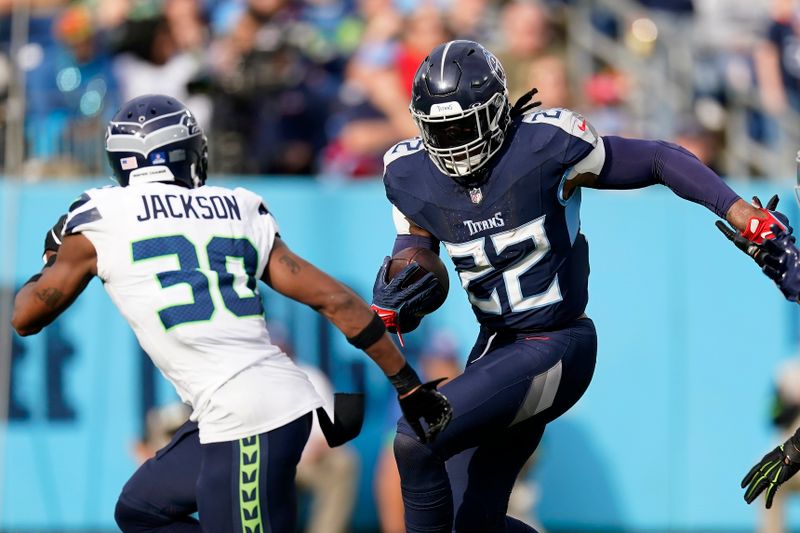 Tennessee Titans running back Derrick Henry (22) runs against Seattle Seahawks cornerback Michael Jackson (30) during the second half of an NFL football game on Sunday, Dec. 24, 2023, in Nashville, Tenn. (AP Photo/George Walker IV)