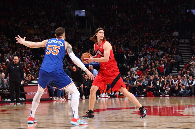 TORONTO, CANADA - MARCH 27: Kelly Olynyk #41 of the Toronto Raptor handles the ball during the game against the New York Knicks on March 27, 2024 at the Scotiabank Arena in Toronto, Ontario, Canada.  NOTE TO USER: User expressly acknowledges and agrees that, by downloading and or using this Photograph, user is consenting to the terms and conditions of the Getty Images License Agreement.  Mandatory Copyright Notice: Copyright 2024 NBAE (Photo by Vaughn Ridley/NBAE via Getty Images)