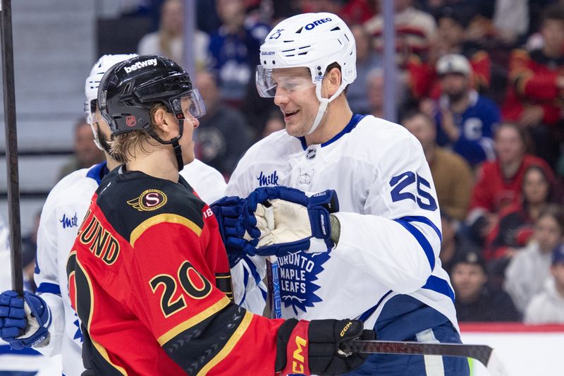 Mar 21, 2026; Ottawa, Ontario, CAN; Ottawa Senators left wing Fabian Zetterlund (20) exchanges words with Toronto Maple Leafs defenseman Brandon Carlo (25) in the first period at the Canadian Tire Centre. Mandatory Credit: Marc DesRosiers-IMAGN Images