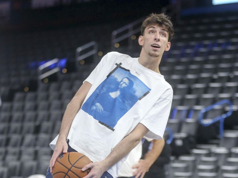 OKLAHOMA CITY, OKLAHOMA - OCTOBER 25: Chet Holmgren #7 of the Oklahoma City Thunder reacts during warms up before a game against the Los Angeles Clippers at Paycom Center on October 25, 2022 in Oklahoma City, Oklahoma. NOTE TO USER: User expressly acknowledges and agrees that, by downloading and or using this photograph, User is consenting to the terms and conditions of the Getty Images License Agreement.  (Photo by Ian Maule/Getty Images)