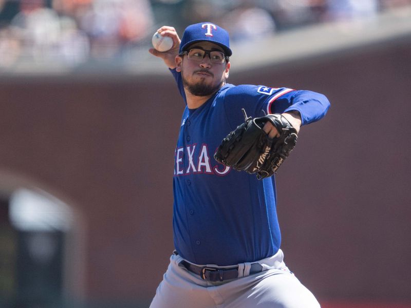 Aug 13, 2023; San Francisco, California, USA; Texas Rangers starting pitcher Dane Dunning (33) pitches during the first inning against the San Francisco Giants at Oracle Park. Mandatory Credit: Stan Szeto-USA TODAY Sports