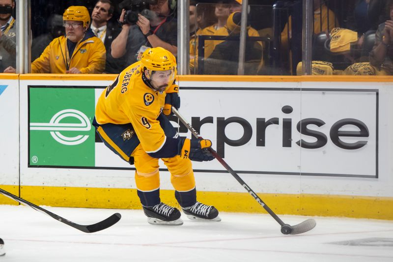 May 3, 2024; Nashville, Tennessee, USA; Nashville Predators left wing Filip Forsberg (9) skates with the puck against the Vancouver Canucks during the first period in game six of the first round of the 2024 Stanley Cup Playoffs at Bridgestone Arena. Mandatory Credit: Steve Roberts-USA TODAY Sports