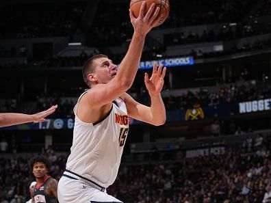 DENVER, CO - NOVEMBER 29: Nikola Jokic #15 of the Denver Nuggets drives to the basket during the game against the Houston Rockets on November 29, 2023 at the Ball Arena in Denver, Colorado. NOTE TO USER: User expressly acknowledges and agrees that, by downloading and/or using this Photograph, user is consenting to the terms and conditions of the Getty Images License Agreement. Mandatory Copyright Notice: Copyright 2023 NBAE (Photo by Bart Young/NBAE via Getty Images)