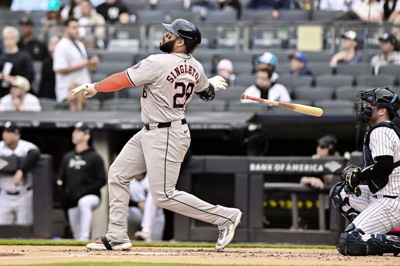 May 9, 2024; Bronx, New York, USA; Houston Astros first baseman Jon Singleton (28) reacts after hitting a two run home run against the New York Yankees during the first inning at Yankee Stadium. Mandatory Credit: John Jones-USA TODAY Sports