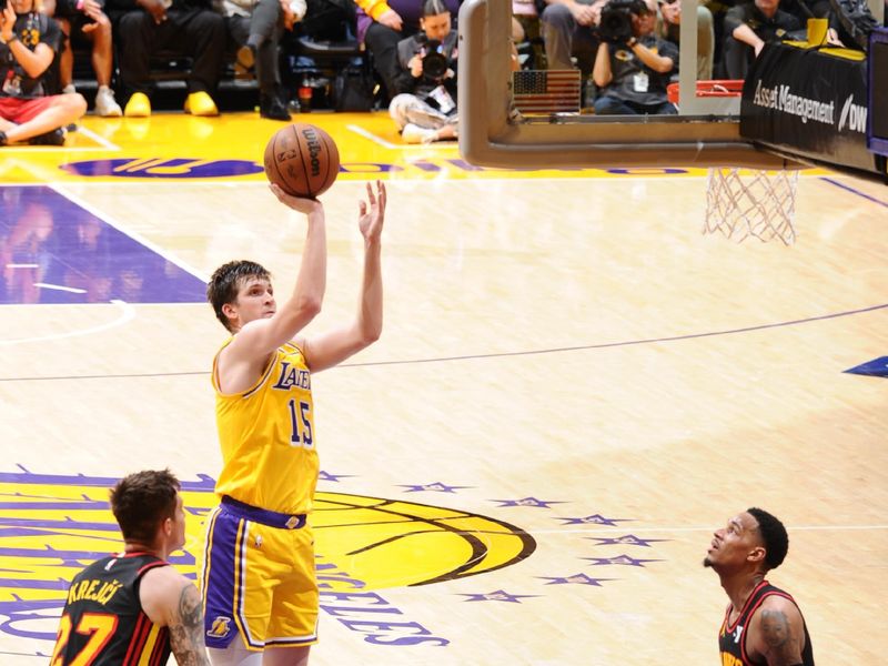 LOS ANGELES, CA - MARCH 18:  Austin Reaves #15 of the Los Angeles Lakers goes to the basket during the game on March 18, 2024 at Crypto.Com Arena in Los Angeles, California. NOTE TO USER: User expressly acknowledges and agrees that, by downloading and/or using this Photograph, user is consenting to the terms and conditions of the Getty Images License Agreement. Mandatory Copyright Notice: Copyright 2024 NBAE (Photo by Adam Pantozzi/NBAE via Getty Images)