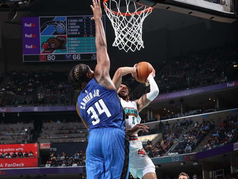 MEMPHIS, TN - OCTOBER 26: Scotty Pippen Jr. #1 of the Memphis Grizzlies drives to the basket during the game against the Orlando Magic on October 26, 2024 at FedExForum in Memphis, Tennessee. NOTE TO USER: User expressly acknowledges and agrees that, by downloading and or using this photograph, User is consenting to the terms and conditions of the Getty Images License Agreement. Mandatory Copyright Notice: Copyright 2024 NBAE (Photo by Joe Murphy/NBAE via Getty Images)