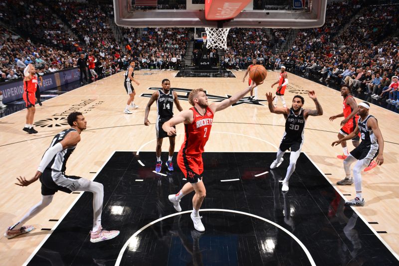 SAN ANTONIO, TX - MARCH 12: Jock Landale #2 of the Houston Rockets rebounds the ball during the game against the San Antonio Spurs on March 12, 2024 at the Frost Bank Center in San Antonio, Texas. NOTE TO USER: User expressly acknowledges and agrees that, by downloading and or using this photograph, user is consenting to the terms and conditions of the Getty Images License Agreement. Mandatory Copyright Notice: Copyright 2024 NBAE (Photos by Jesse D. Garrabrant/NBAE via Getty Images)