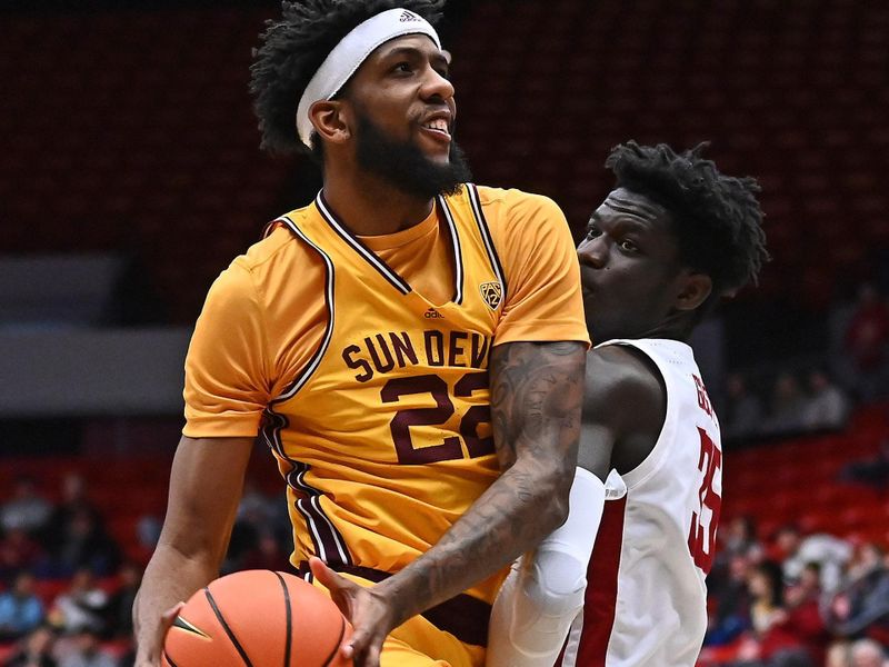 Jan 28, 2023; Pullman, Washington, USA; Arizona State Sun Devils forward Warren Washington (22) shoots the ball against Washington State Cougars forward Mouhamed Gueye (35) in the first half at Friel Court at Beasley Coliseum. Mandatory Credit: James Snook-USA TODAY Sports