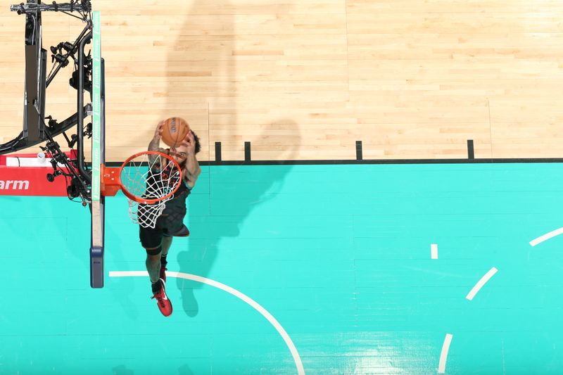 WASHINGTON, DC -? APRIL 12: Justin Champagnie #9 of the Washington Wizards dunks the ball during the game against the Chicago Bulls on April 12, 2024 at Capital One Arena in Washington, DC. NOTE TO USER: User expressly acknowledges and agrees that, by downloading and or using this Photograph, user is consenting to the terms and conditions of the Getty Images License Agreement. Mandatory Copyright Notice: Copyright 2024 NBAE (Photo by Stephen Gosling/NBAE via Getty Images)