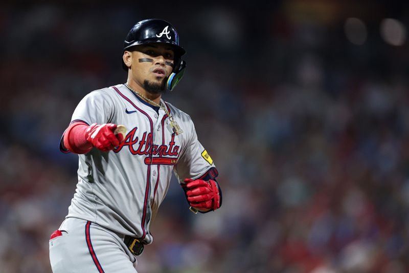 Aug 30, 2024; Philadelphia, Pennsylvania, USA; Atlanta Braves shortstop Orlando Arcia (11) runs the bases after hitting a home run during the sixth inning against the Philadelphia Phillies at Citizens Bank Park. Mandatory Credit: Bill Streicher-USA TODAY Sports