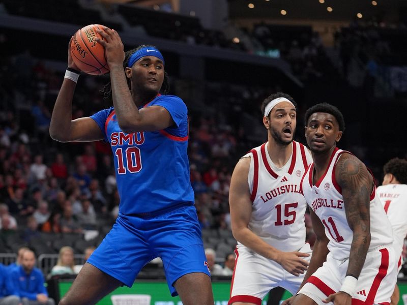 Mar 11, 2026; Charlotte, NC, USA; Southern Methodist University Mustangs center Jaden Toombs (10) rebounds against the Louisville Cardinals during the first half at Spectrum Center. Mandatory Credit: Jim Dedmon-Imagn Images