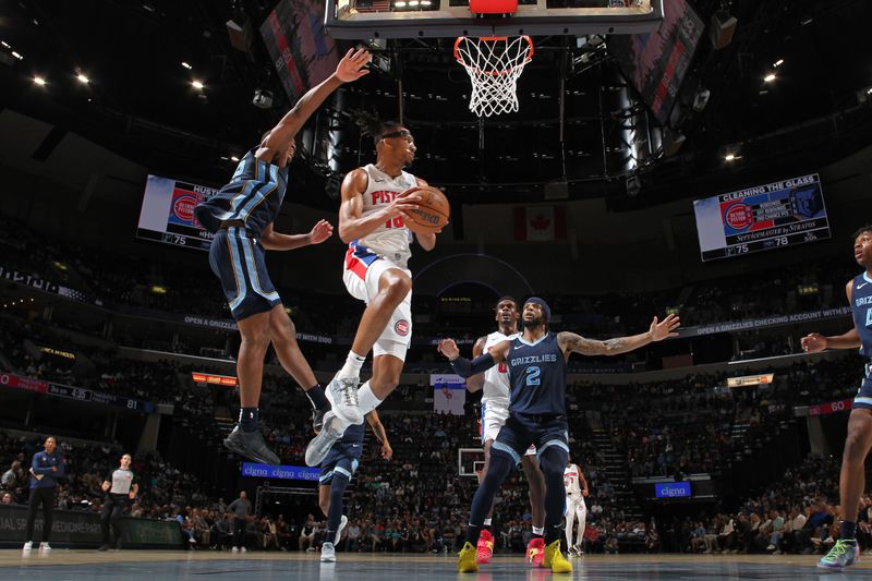 MEMPHIS, TN - APRIL 5: Tosan Evbuomwan #18 of the Detroit Pistons looks to pass the ball during the game against the Memphis Grizzlies on April 5, 2024 at FedExForum in Memphis, Tennessee. NOTE TO USER: User expressly acknowledges and agrees that, by downloading and or using this photograph, User is consenting to the terms and conditions of the Getty Images License Agreement. Mandatory Copyright Notice: Copyright 2024 NBAE (Photo by Joe Murphy/NBAE via Getty Images)