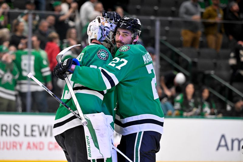 Nov 20, 2024; Dallas, Texas, USA; Dallas Stars left wing Mason Marchment (27) hugs goaltender Jake Oettinger (29) after the Stars defeat the San Jose Sharks at the American Airlines Center. Mandatory Credit: Jerome Miron-Imagn Images