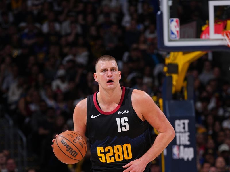 DENVER, CO - APRIL 22: Nikola Jokic #15 of the Denver Nuggets handles the ball during the game against the Los Angeles Lakers on April 22, 2024 at the Ball Arena in Denver, Colorado. NOTE TO USER: User expressly acknowledges and agrees that, by downloading and/or using this Photograph, user is consenting to the terms and conditions of the Getty Images License Agreement. Mandatory Copyright Notice: Copyright 2024 NBAE (Photo by Bart Young/NBAE via Getty Images)