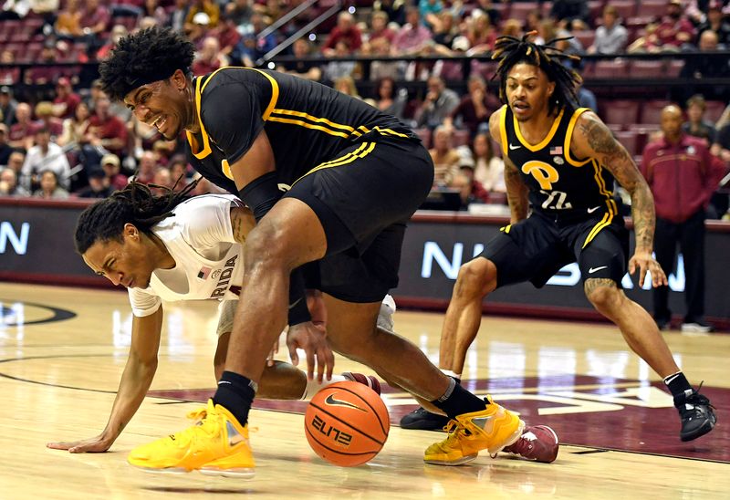 Feb 11, 2023; Tallahassee, Florida, USA; Florida State Seminoles guard Caleb Mills (4) fights for a loose ball with Pittsburgh Panthers forward Blake Hinson (2) during the second half at Donald L. Tucker Center. Mandatory Credit: Melina Myers-USA TODAY Sports