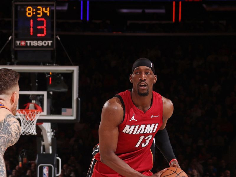 NEW YORK, NY - JANUARY 27: Bam Adebayo #13 of the Miami Heat looks on during the game against the New York Knicks on January 27, 2024 at Madison Square Garden in New York City, New York.  NOTE TO USER: User expressly acknowledges and agrees that, by downloading and or using this photograph, User is consenting to the terms and conditions of the Getty Images License Agreement. Mandatory Copyright Notice: Copyright 2024 NBAE  (Photo by Nathaniel S. Butler/NBAE via Getty Images)