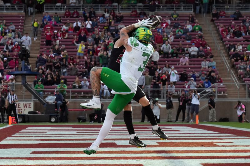 Sep 30, 2023; Stanford, California, USA; Oregon Ducks tight end Terrance Ferguson (3) catches a touchdown pass against Stanford Cardinal safety Scotty Edwards (obscured) during the third quarter at Stanford Stadium. Mandatory Credit: Darren Yamashita-USA TODAY Sports
