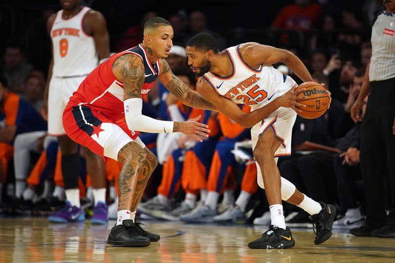 NEW YORK, NEW YORK - OCTOBER 09: Mikal Bridges #25 of the New York Knicks handles the ball against Kyle Kuzma #33 of the Washington Wizards during the first half of a preseason game at Madison Square Garden on October 09, 2024 in New York City. NOTE TO USER: User expressly acknowledges and agrees that, by downloading and or using this Photograph, user is consenting to the terms and conditions of the Getty Images License Agreement. (Photo by Evan Bernstein/Getty Images)