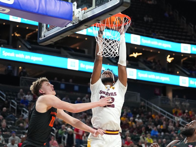 Mar 8, 2023; Las Vegas, NV, USA; Arizona State Sun Devils forward Warren Washington (22) shoots against Oregon State Beavers forward Tyler Bilodeau (10) during the first half at T-Mobile Arena. Mandatory Credit: Stephen R. Sylvanie-USA TODAY Sports