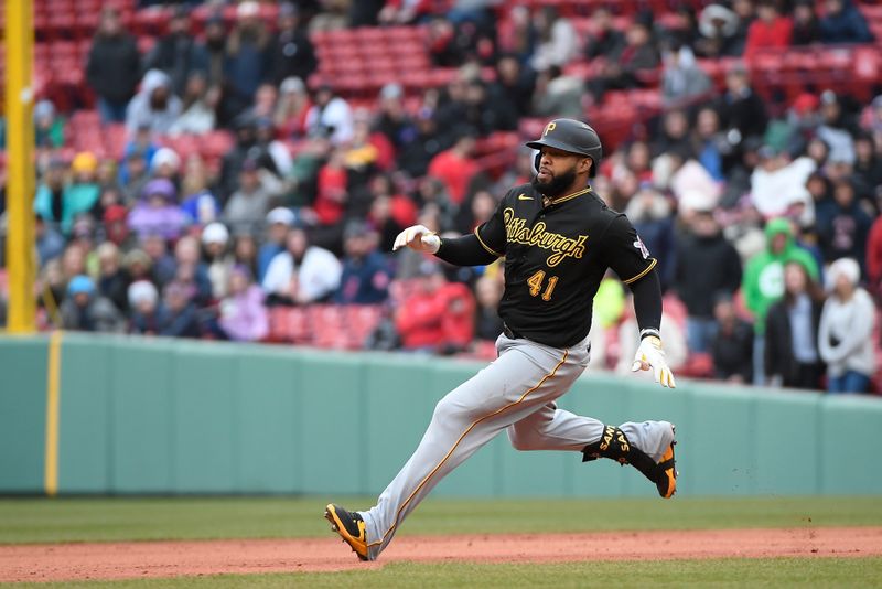 Apr 5, 2023; Boston, Massachusetts, USA; Pittsburgh Pirates first baseman Carlos Santana (41) runs to second base during the ninth inning against the Boston Red Sox at Fenway Park. Mandatory Credit: Eric Canha-USA TODAY Sports