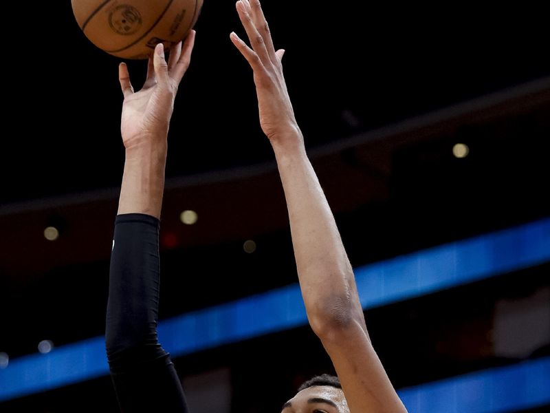 HOUSTON, TEXAS - DECEMBER 11: Victor Wembanyama #1 of the San Antonio Spurs warms up prior to facing the Houston Rockets at Toyota Center on December 11, 2023 in Houston, Texas. NOTE TO USER: User expressly acknowledges and agrees that, by downloading and or using this photograph, User is consenting to the terms and conditions of the Getty Images License Agreement.? (Photo by Carmen Mandato/Getty Images)