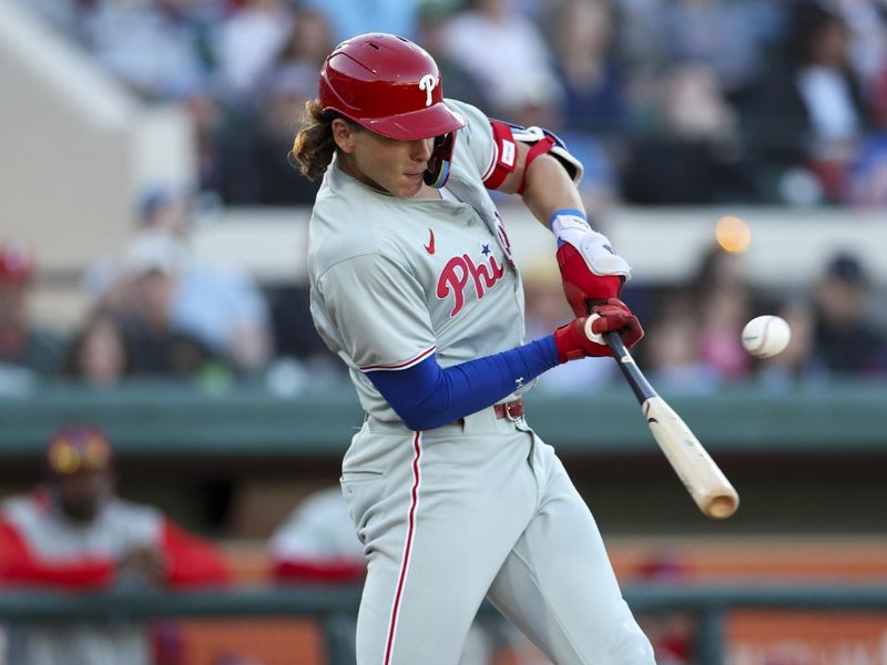 Mar 19, 2024; Lakeland, Florida, USA;  Philadelphia Phillies first baseman Alec Bohm (28) hits a base hit against the Detroit Tigers in the fourth inning at Publix Field at Joker Marchant Stadium. Mandatory Credit: Nathan Ray Seebeck-USA TODAY Sports