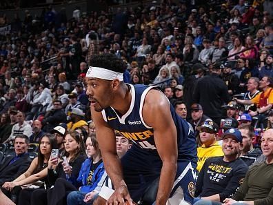 DENVER, CO - JANUARY 1: Jalen Pickett #24 of the Denver Nuggets handles the ball during the game against the Charlotte Hornets on January 1, 2024 at the Ball Arena in Denver, Colorado. NOTE TO USER: User expressly acknowledges and agrees that, by downloading and/or using this Photograph, user is consenting to the terms and conditions of the Getty Images License Agreement. Mandatory Copyright Notice: Copyright 2024 NBAE (Photo by Garrett Ellwood/NBAE via Getty Images)