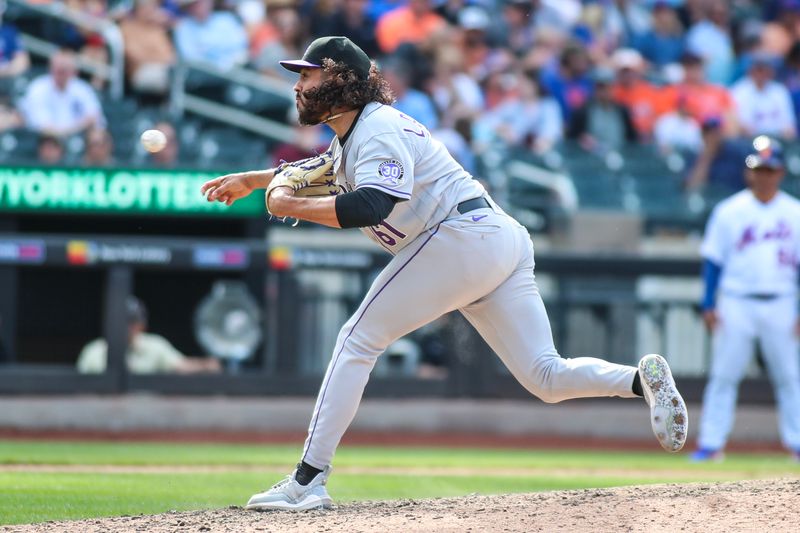 May 7, 2023; New York City, New York, USA;  Colorado Rockies relief pitcher Justin Lawrence (61) pitches in the ninth inning against the New York Mets at Citi Field. Mandatory Credit: Wendell Cruz-USA TODAY Sports