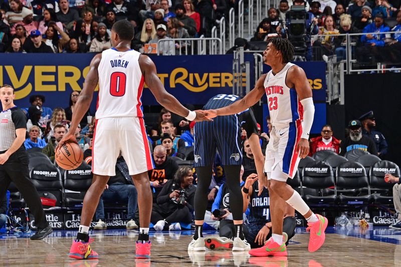 DETROIT, MI - JANUARY 1: Jalen Duren #0 and Jaden Ivey #23 of the Detroit Pistons high five during the game against the Orlando Magic on January 1, 2025 at Little Caesars Arena in Detroit, Michigan. NOTE TO USER: User expressly acknowledges and agrees that, by downloading and/or using this photograph, User is consenting to the terms and conditions of the Getty Images License Agreement. Mandatory Copyright Notice: Copyright 2025 NBAE (Photo by Chris Schwegler/NBAE via Getty Images)