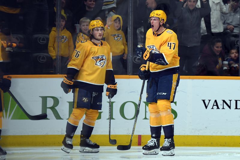 Dec 23, 2023; Nashville, Tennessee, USA; Nashville Predators right wing Michael McCarron (47) celebrates after a goal during the second period against the Dallas Stars at Bridgestone Arena. Mandatory Credit: Christopher Hanewinckel-USA TODAY Sports