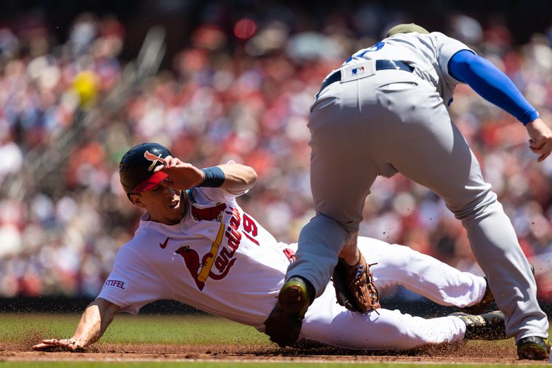 May 21, 2023; St. Louis, Missouri, USA;  St. Louis Cardinals Tommy Edman (19) runs the bases against the Los Angeles Dodgers at Busch Stadium. Mandatory Credit: Zach Dalin-USA TODAY Sports