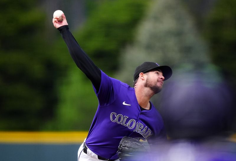 May 8, 2024; Denver, Colorado, USA; Colorado Rockies starting pitcher Peter Lambert (20) delivers a pitch in the first inning against the San Francisco Giants at Coors Field. Mandatory Credit: Ron Chenoy-USA TODAY Sports