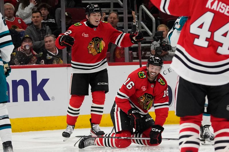 Oct 17, 2024; Chicago, Illinois, USA; Chicago Blackhawks center Jason Dickinson (16) celebrates his goal against the San Jose Sharks during the third period at United Center. Mandatory Credit: David Banks-Imagn Images