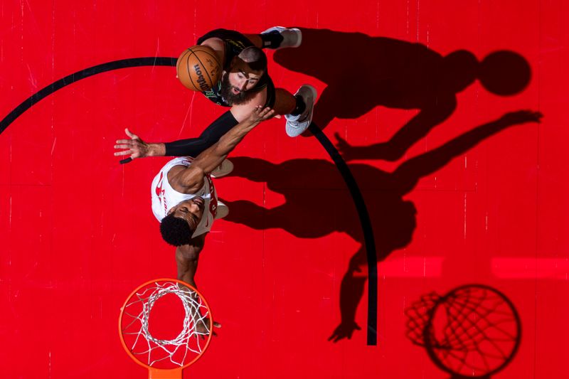 TORONTO, CANADA - MARCH 5:  Jonas Valanciunas #17 of the New Orleans Pelicans goes to the basket during the game on March 5, 2024 at the Scotiabank Arena in Toronto, Ontario, Canada.  NOTE TO USER: User expressly acknowledges and agrees that, by downloading and or using this Photograph, user is consenting to the terms and conditions of the Getty Images License Agreement.  Mandatory Copyright Notice: Copyright 2024 NBAE (Photo by Mark Blinch/NBAE via Getty Images)