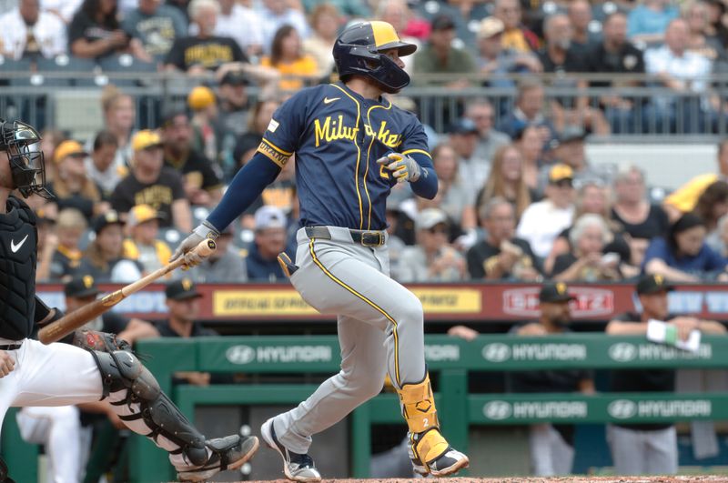 Sep 26, 2024; Pittsburgh, Pennsylvania, USA;  Milwaukee Brewers second baseman Brice Turang (2) hits an RBI single against the Pittsburgh Pirates during the fifth inning at PNC Park. Mandatory Credit: Charles LeClaire-Imagn Images