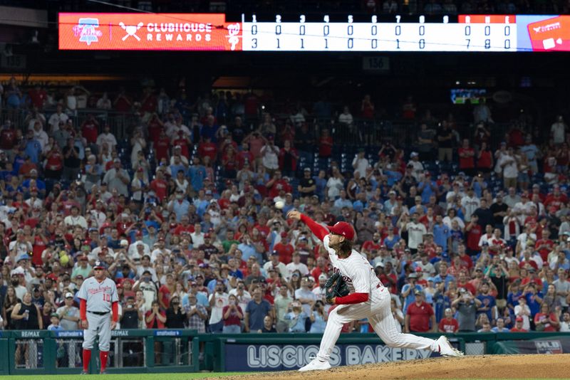 Aug 9, 2023; Philadelphia, Pennsylvania, USA; Philadelphia Phillies starting pitcher Michael Lorenzen (22) throws a pitch during the ninth inning against the Washington Nationals at Citizens Bank Park. Mandatory Credit: Bill Streicher-USA TODAY Sports