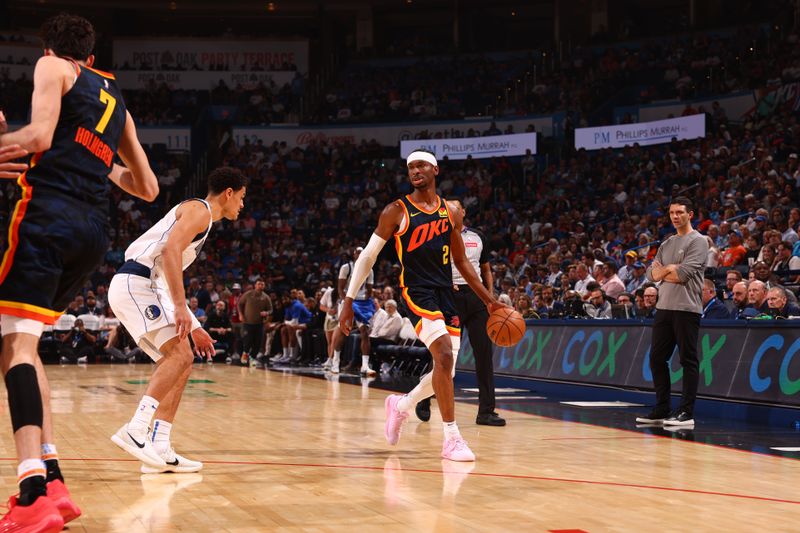 OKLAHOMA CITY, OK - APRIL 14:  Shai Gilgeous-Alexander #2 of the Oklahoma City Thunder dribbles the ball during the game against the Dallas Mavericks on April 14, 2024 at Paycom Arena in Oklahoma City, Oklahoma. NOTE TO USER: User expressly acknowledges and agrees that, by downloading and or using this photograph, User is consenting to the terms and conditions of the Getty Images License Agreement. Mandatory Copyright Notice: Copyright 2024 NBAE (Photo by Zach Beeker/NBAE via Getty Images)