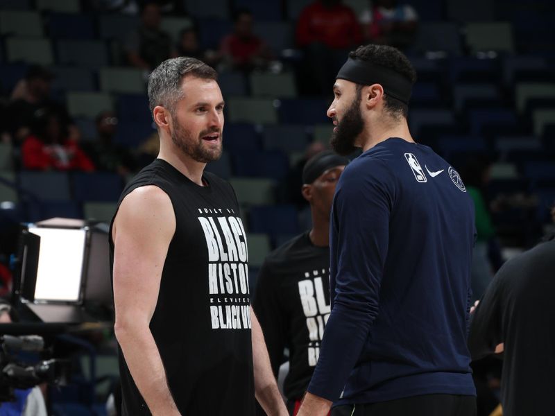 NEW ORLEANS, LA - FEBRUARY 23: Kevin Love #42 of the Miami Heat talks with Larry Nance Jr. #22 of the New Orleans Pelicans before the game on February 23, 2024 at the Smoothie King Center in New Orleans, Louisiana. NOTE TO USER: User expressly acknowledges and agrees that, by downloading and or using this Photograph, user is consenting to the terms and conditions of the Getty Images License Agreement. Mandatory Copyright Notice: Copyright 2024 NBAE (Photo by Layne Murdoch Jr./NBAE via Getty Images)