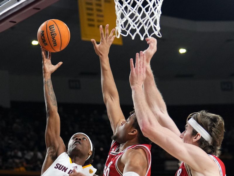 Feb 18, 2023; Tempe, Arizona, USA; Arizona State Sun Devils guard DJ Horne (0) shoots against the Utah Utes during the second half at Desert Financial Arena. Mandatory Credit: Joe Camporeale-USA TODAY Sports