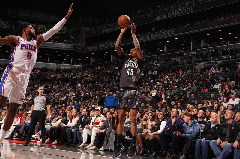 BROOKLYN, NY - FEBRUARY 12: Keon Johnson #45 of the Brooklyn Nets shoots the ball during the game against the Philadelphia 76ers  on February 12, 2025 at Barclays Center in Brooklyn, New York. NOTE TO USER: User expressly acknowledges and agrees that, by downloading and or using this Photograph, user is consenting to the terms and conditions of the Getty Images License Agreement. Mandatory Copyright Notice: Copyright 2025 NBAE (Photo by Jesse D. Garrabrant/NBAE via Getty Images)