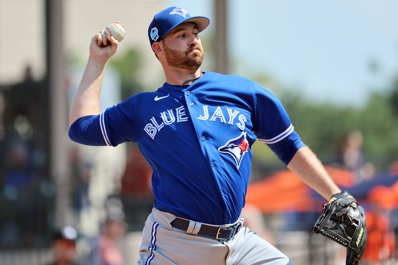 Mar 4, 2023; Lakeland, Florida, USA;  Toronto Blue Jays pitcher Drew Hutchison (36) throws a pitch during the first inning against the Detroit Tigers at Publix Field at Joker Marchant Stadium. Mandatory Credit: Kim Klement-USA TODAY Sports