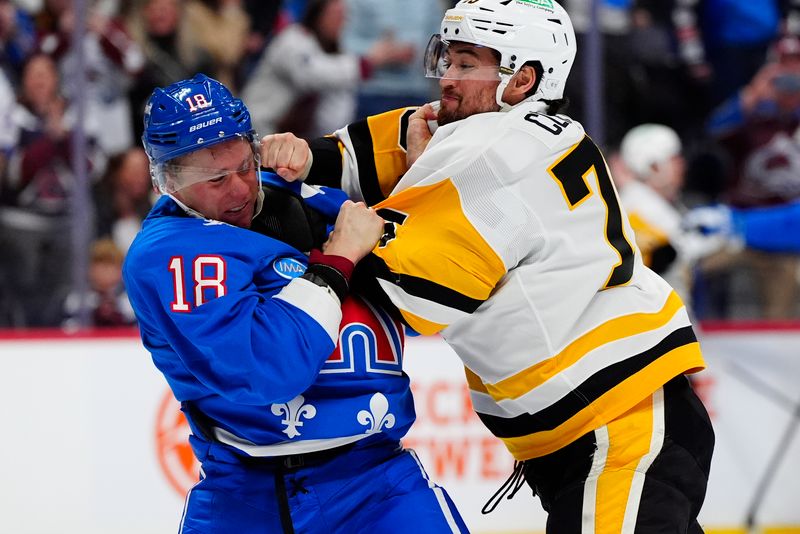 Mar 16, 2026; Denver, Colorado, USA; Pittsburgh Penguins defenseman Connor Clifton (75) and Colorado Avalanche center Jack Drury (18) fight in the third period at Ball Arena. Mandatory Credit: Ron Chenoy-Imagn Images
