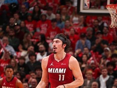 MIAMI, FL - DECEMBER 25:  Jaime Jaquez Jr. #11 of the Miami Heat goes to the basket during the game on December 25, 2023 at Kaseya Center Arena in Miami, Florida. NOTE TO USER: User expressly acknowledges and agrees that, by downloading and or using this Photograph, user is consenting to the terms and conditions of the Getty Images License Agreement. Mandatory Copyright Notice: Copyright 2023 NBAE (Photo by Issac Baldizon/NBAE via Getty Images)