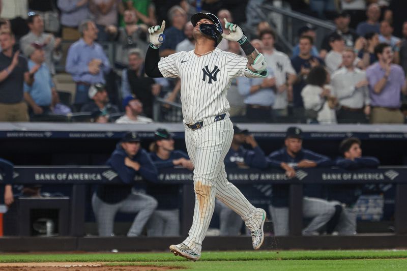 May 21, 2024; Bronx, New York, USA;  New York Yankees second baseman Gleyber Torres (25) reacts after hitting a three run home run against the Seattle Mariners during the seventh inning at Yankee Stadium. Mandatory Credit: Vincent Carchietta-USA TODAY Sports