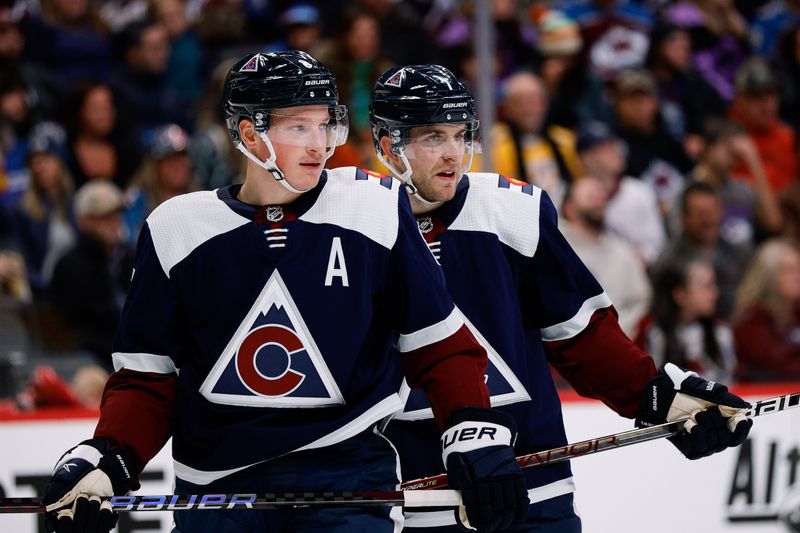 Nov 10, 2022; Denver, Colorado, USA; Colorado Avalanche defenseman Cale Makar (8) and defenseman Devon Toews (7) in the first period against the Nashville Predators at Ball Arena. Mandatory Credit: Isaiah J. Downing-USA TODAY Sports