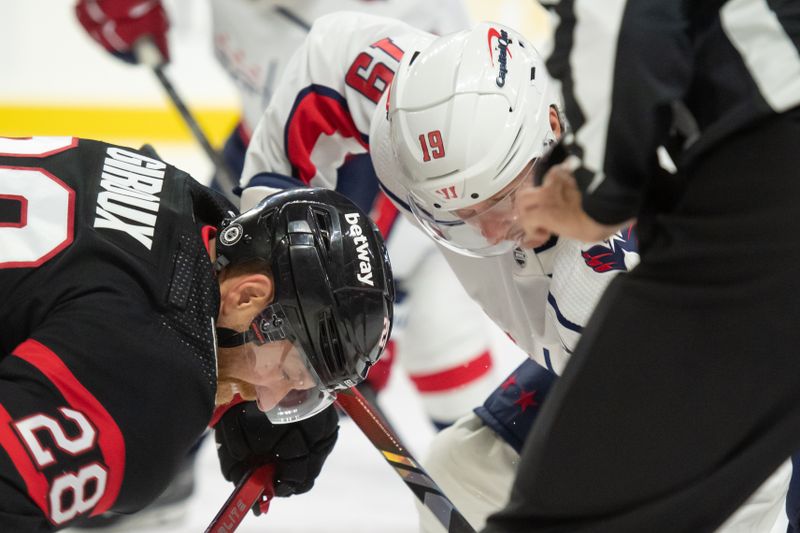 Oct 18, 2023; Ottawa, Ontario, CAN; Ottawa Senators right wing Claude Giroux(28) faces off against Washington Capitals center Nicklas Backstrom (19) in the second period at the Canadian Tire Centre. Mandatory Credit: Marc DesRosiers-USA TODAY Sports