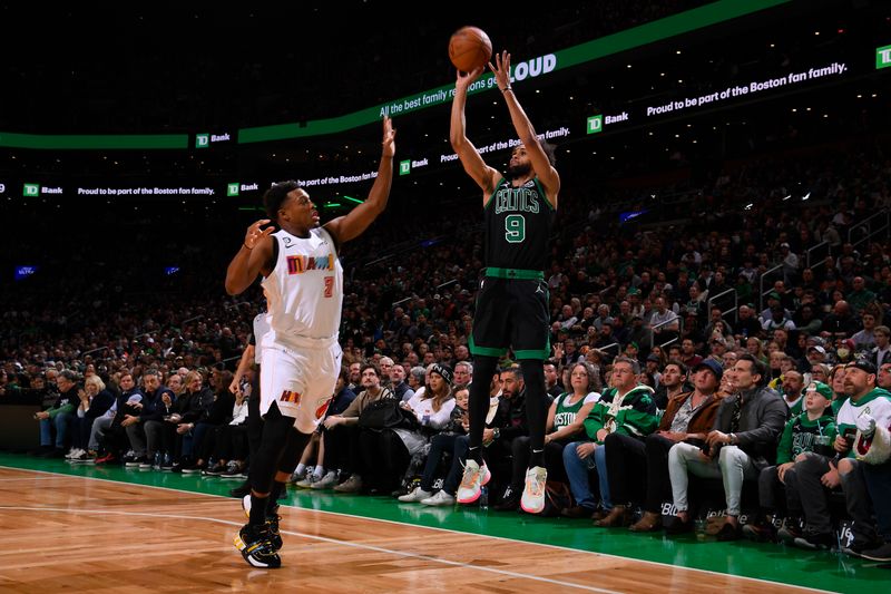 BOSTON, MA - DECEMBER 2: Derrick White #9 of the Boston Celtics shoots the ball during the game against the Miami Heat on December 2, 2022 at the TD Garden in Boston, Massachusetts.  NOTE TO USER: User expressly acknowledges and agrees that, by downloading and or using this photograph, User is consenting to the terms and conditions of the Getty Images License Agreement. Mandatory Copyright Notice: Copyright 2022 NBAE  (Photo by Brian Babineau/NBAE via Getty Images)