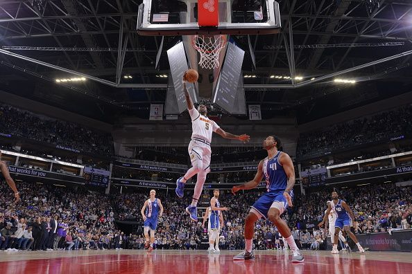 SACRAMENTO, CA - DECEMBER 2: Kentavious Caldwell-Pope #5 of the Denver Nuggets drives to the basket during the game against the Sacramento Kings on December 2, 2023 at Golden 1 Center in Sacramento, California. NOTE TO USER: User expressly acknowledges and agrees that, by downloading and or using this Photograph, user is consenting to the terms and conditions of the Getty Images License Agreement. Mandatory Copyright Notice: Copyright 2023 NBAE (Photo by Rocky Widner/NBAE via Getty Images)