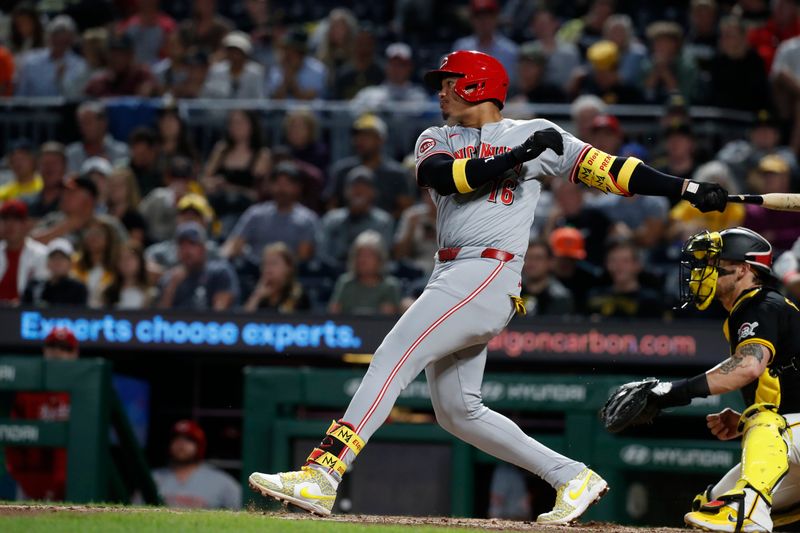 Aug 22, 2024; Pittsburgh, Pennsylvania, USA;  Cincinnati Reds third baseman Noelvi Marte (16) hits a single against the Pittsburgh Pirates during the eighth inning at PNC Park. Mandatory Credit: Charles LeClaire-USA TODAY Sports